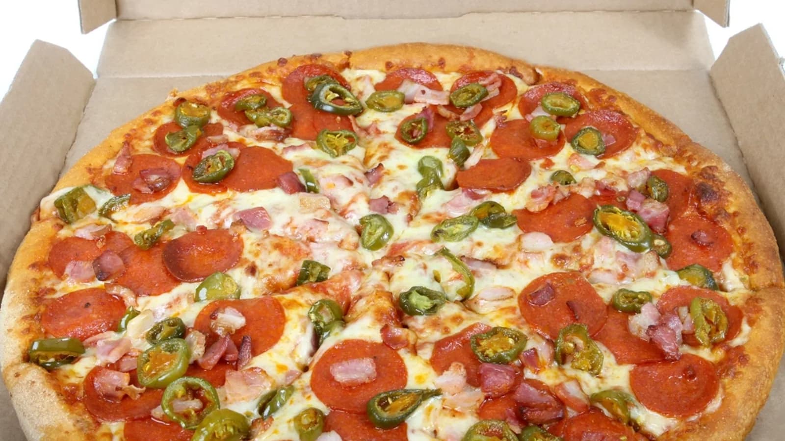 A whole pizza inside an open takeaway box